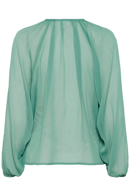 Die leichte Bluse mit Rüschen und lockerer Passform besticht durch einen Rundhalsausschnitt mit Bindeband, lange Ärmel und ein feminines Design. Ideal für flexible Stylingmöglichkeiten und angenehmen Tragekomfort.  Schonwäsche 30°, Nicht bleichen, Nicht im Trockner trocknen, Tropnass aufhängen, Kalt bügeln max. 110° C, Nicht trockenreinigen  100% Polyester (Recycelt)