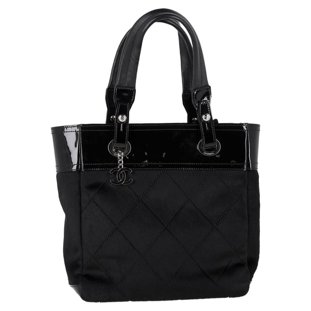 VINTAGE, RRP AS NEW
The Chanel Small Paris Biarritz Tote Bag in Black Calf Hair and Leather offers a perfect balance of luxury and functionality, featuring a chic combination of smooth leather and plush calf hair for a distinctive texture. Its compact size and structured shape make it an ideal choice for both everyday use and special occasions. Pair it with a tailored coat and boots for a sophisticated, city-ready look, or wear it with a casual dress and sneakers for a more relaxed yet elevated vibe. The timeless black color and signature Chanel design ensure it’s a versatile and statement piece in any wardrobe.

 Chanel Small Paris Biarritz Tote Bag in Black Calf Hair and Leather

Condition: Excellent
Signs of wear: No retail tag, No visible sign of wear., 
Packaging: None
Color: Black
Material: Calf hair
Size: One Size | One Size
Measurements: Width: 110; Height: 270; Length: 320; Handle drop: 190; Strap length: 0
SKU: NAPPUGBBA465190W