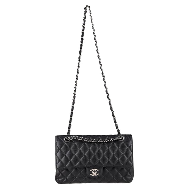 VINTAGE, RRP AS NEW
A timeless icon of Parisian elegance, the Chanel Medium Double Flap Bag in black caviar leather is the ultimate investment piece. Its signature diamond quilting, silver-tone CC turn-lock, and leather-threaded chain strap embody the house’s heritage of effortless sophistication. The structured silhouette opens to reveal an inner flap and a rich burgundy leather interior, complete with thoughtfully placed pockets — a masterclass in both form and function.


Chanel Caviar Quilted Medium Double Flap Bag in Black Leather
Condition: Excellent
Signs of wear: No retail tag, No visible sign of wear.,  light wear on interior
Packaging: Dust bag
Color: black
Material: Leather | leather
Size: One Size | One Size
Measurements: Width: 60; Height: 165; Length: 250
SKU: NAPPUGBBA504139W