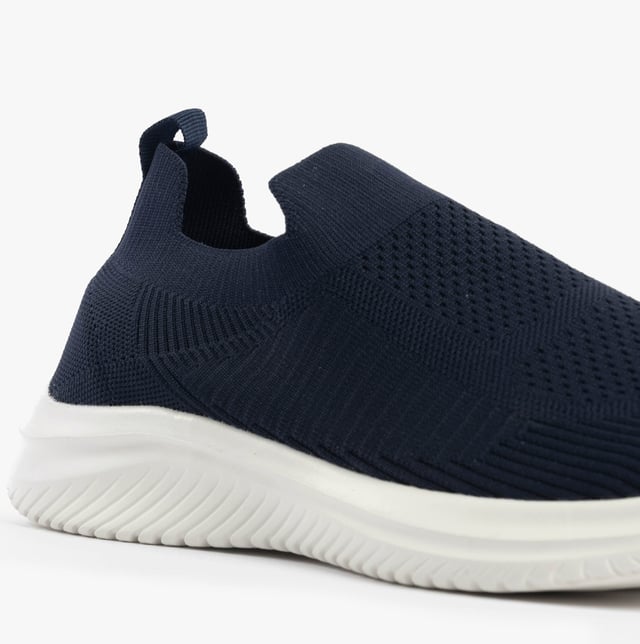 These casual women's slip-on shoes feature a textile upper, breathable lining, and rubber sole with a low heel, offering comfort and easy wear for everyday activities