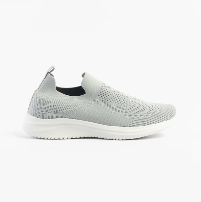 These casual women's slip-on shoes feature a textile upper, breathable lining, and rubber sole with a low heel, offering comfort and easy wear for everyday activities