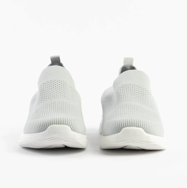 These casual women's slip-on shoes feature a textile upper, breathable lining, and rubber sole with a low heel, offering comfort and easy wear for everyday activities