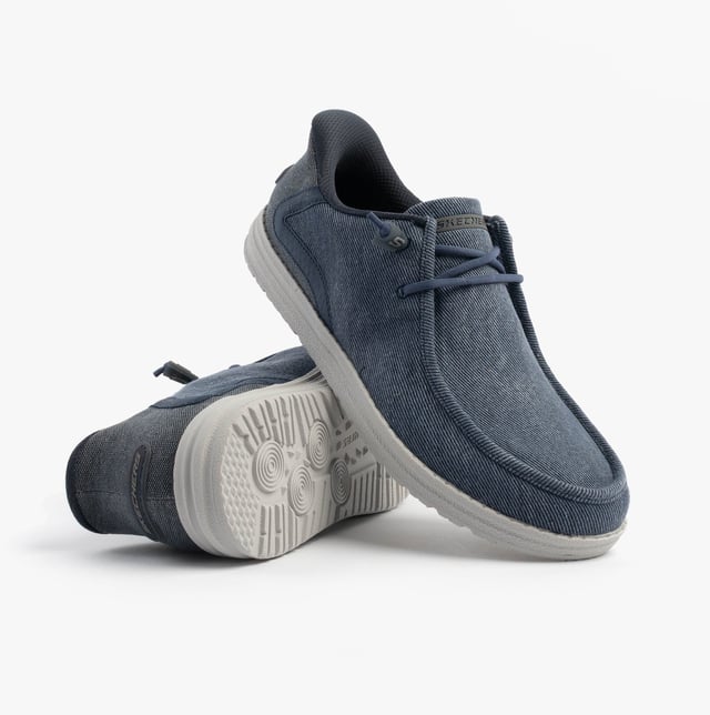 These casual men's shoes feature a canvas upper, rubber sole, and relaxed fit. Equipped with air-cooled memory foam and lace-up closure for comfort and easy wear