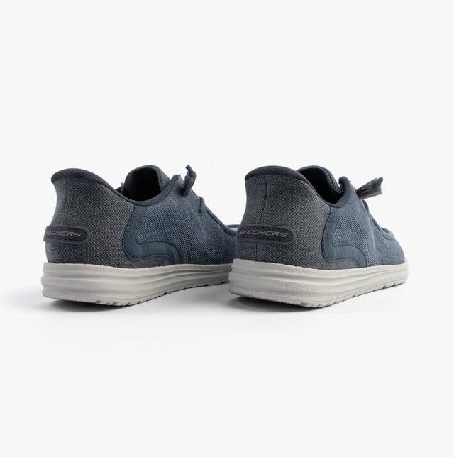 These casual men's shoes feature a canvas upper, rubber sole, and relaxed fit. Equipped with air-cooled memory foam and lace-up closure for comfort and easy wear