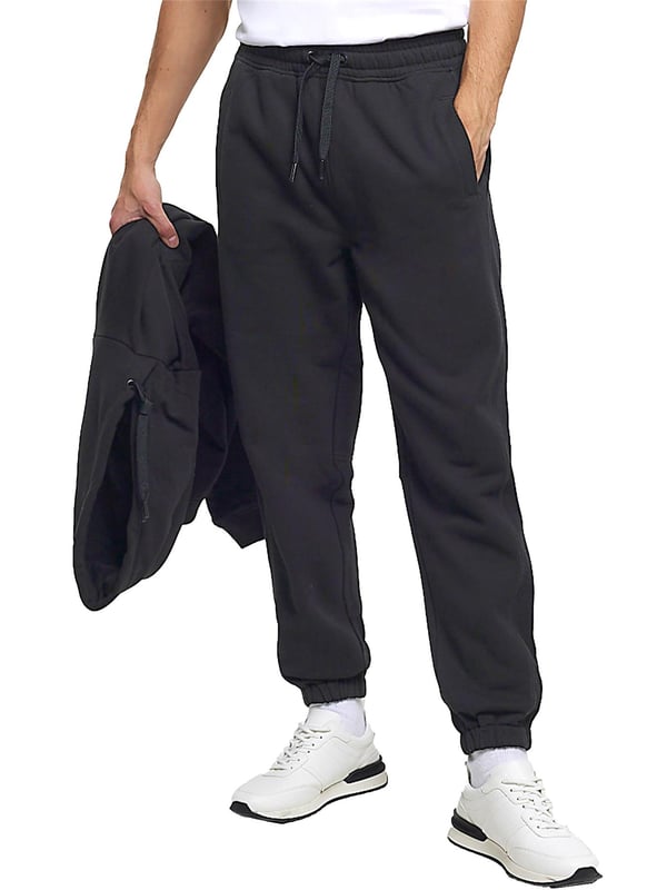 Expertly crafted for both casual and work wear, the Kruze Mens Tracksuit Set boasts unparalleled comfort and versatility. The crew neckline and long sleeves of the hoodie provide a timeless style, while the joggers feature an adjustable waistband and drawstrings for a perfect fit. Accompanied by side pockets and cuffed ankles, this set is ideal for any occasion. 52% Cotton, 48% Polyester. Available in Black, Grey and Navy colours.
