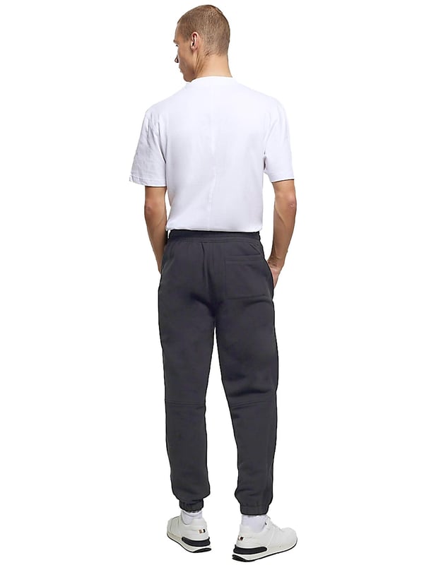 Expertly crafted for both casual and work wear, the Kruze Mens Tracksuit Set boasts unparalleled comfort and versatility. The crew neckline and long sleeves of the hoodie provide a timeless style, while the joggers feature an adjustable waistband and drawstrings for a perfect fit. Accompanied by side pockets and cuffed ankles, this set is ideal for any occasion. 52% Cotton, 48% Polyester. Available in Black, Grey and Navy colours.