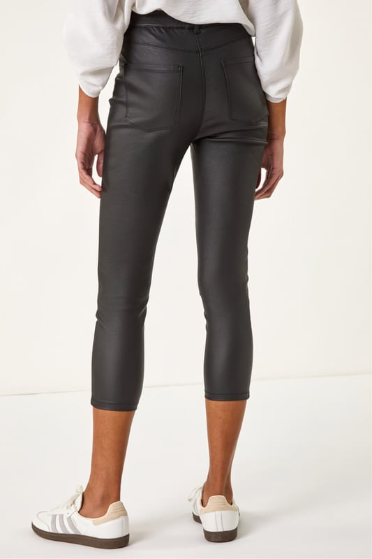 Metallic Coated Crop Jeggings Metallic Coated Crop Jeggings from Roman. Take your style to the next level with these metallic coated crop jeggings. This smart pair is adorned with essential front and back pockets featuring functional belt loops for a practical edge. The jeggings are cut in a fitting shape, crafted from stretch woven fabric for all-day comfort. Perfect for any occasion, pair these jeggings with a blouse for a sophisticated look!