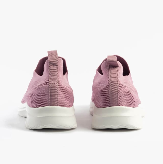 These casual women's slip-on shoes feature a textile upper, breathable lining, rubber sole, and a low heel, offering comfort and ease for everyday wear