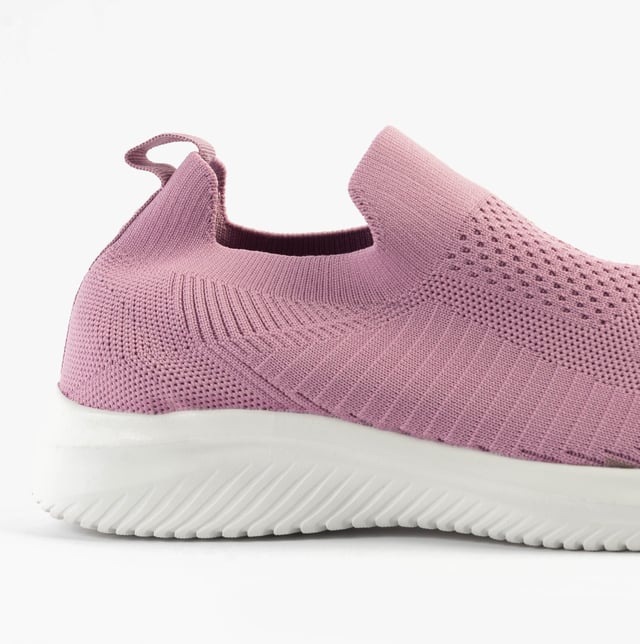 These casual women's slip-on shoes feature a textile upper, breathable lining, rubber sole, and a low heel, offering comfort and ease for everyday wear