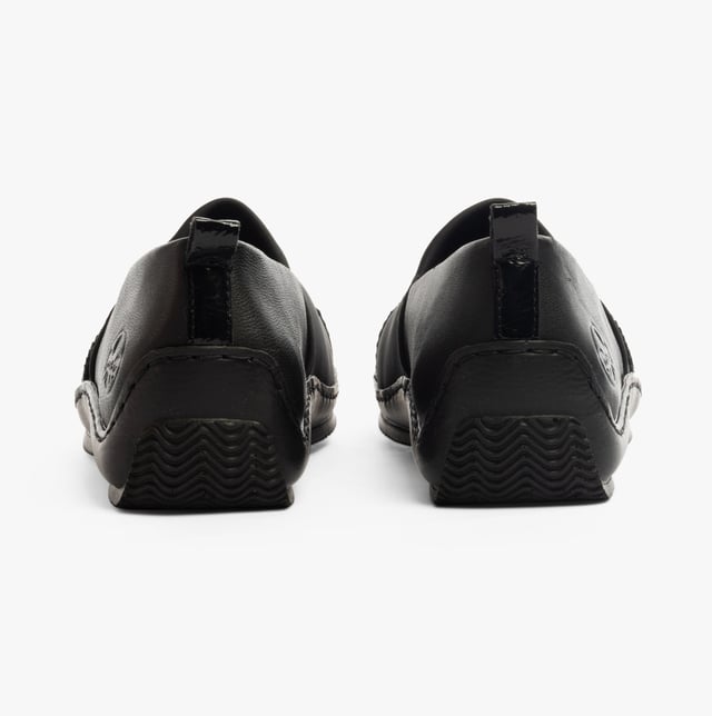 These casual slip-on shoes feature a leather upper, textile lining, and a lightweight RIRICON sole. Designed for comfort and breathability, ideal for everyday wear
