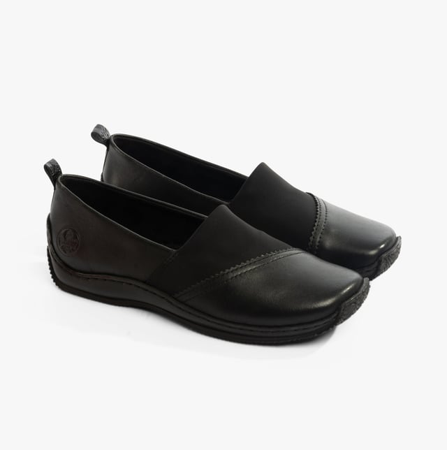 These casual slip-on shoes feature a leather upper, textile lining, and a lightweight RIRICON sole. Designed for comfort and breathability, ideal for everyday wear