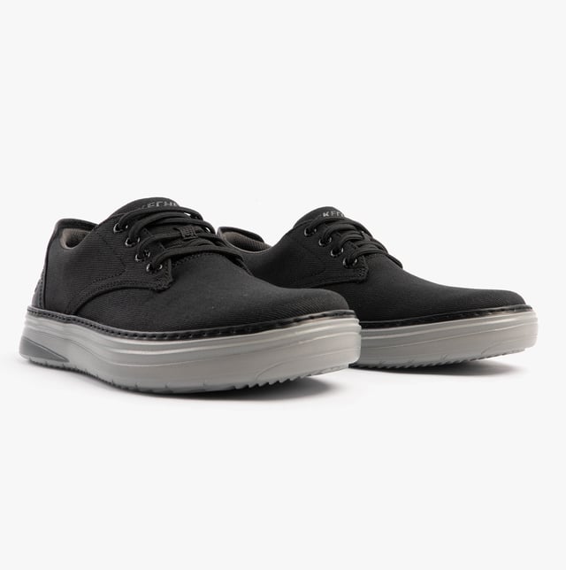 Skechers Hyland - Ratner Mens Shoes Black These casual men's shoes feature a canvas upper, textile lining, rubber sole, and lace-up closure. With air-cooled memory foam and a relaxed fit, they're ideal for everyday comfort