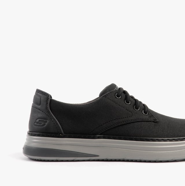 Skechers Hyland - Ratner Mens Shoes Black These casual men's shoes feature a canvas upper, textile lining, rubber sole, and lace-up closure. With air-cooled memory foam and a relaxed fit, they're ideal for everyday comfort