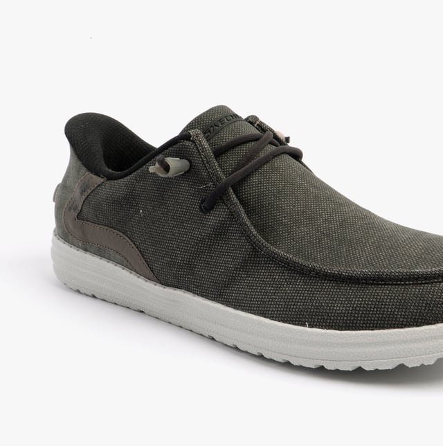 These casual men's shoes feature a canvas upper, textile lining, rubber sole, and slip-in design. They offer comfort with air-cooled memory foam and a relaxed fit for everyday wear