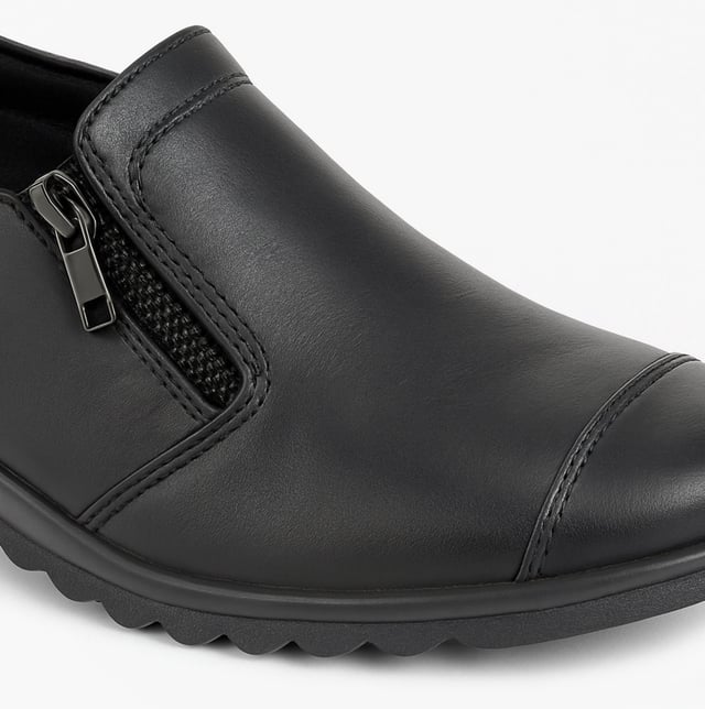 Casual shoes with a PU upper and sole feature a lightweight design and a zip closure, making them comfortable for everyday wear and easy to slip on