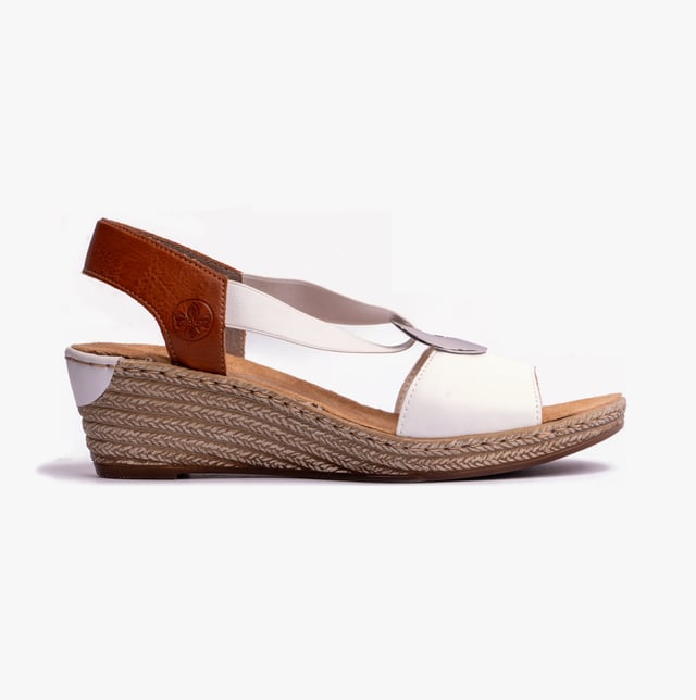 These women's slip-on wedge sandals feature a synthetic upper, breathable textile lining, and a RIRICON sole, offering comfort and a relaxed fit for casual wear
