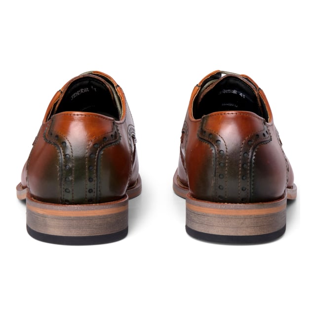 Elevate your formal wardrobe with the Justin Reess Jenson Men’s Oxford Shoes. Crafted from smooth brown leather with a distinctive green hue, these shoes blend timeless design with a modern edge—perfect for business, weddings, and formal occasions.

Brown Leather with Green Hue for a unique and eye-catching finish
Elegant Oxford Styling with clean lines and a streamlined silhouette
Classic Lace-Up Closure ensures a secure fit and polished look
100% Leather Upper for quality, durability, and refined appeal
Cushioned Insole delivers comfort during extended wear
Supportive Inner Construction designed for all-day wearability
Ideal for Formal Events, office wear, or sophisticated day-to-evening transitions