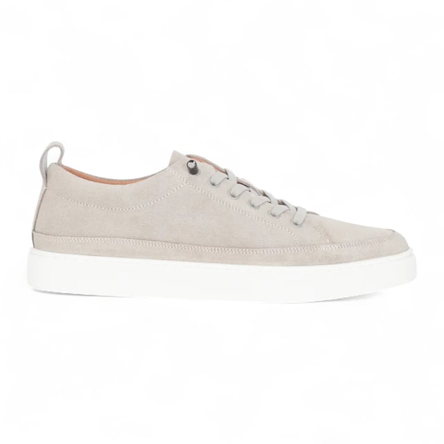 Stay casual and stylish with the Josh Men's Suede Leather Trainers. Made from genuine suede leather, these trainers deliver a soft, premium feel paired with a versatile grey tone that fits effortlessly into your daily wardrobe. The lace-up design ensures a secure fit, while the durable rubber sole provides traction and comfort for everyday wear — whether you're on the go or keeping it laid-back.

100% Genuine Suede Leather Upper for a soft and refined finish
Classic Lace-Up Closure for adjustable fit and everyday support
Neutral Colour pairs well with jeans, chinos, or joggers
Durable Rubber Sole offers grip and long-lasting wear
Comfortable Interior suitable for extended walking or casual outings
Perfect for Daily Use, weekend wear, and smart-casual looks