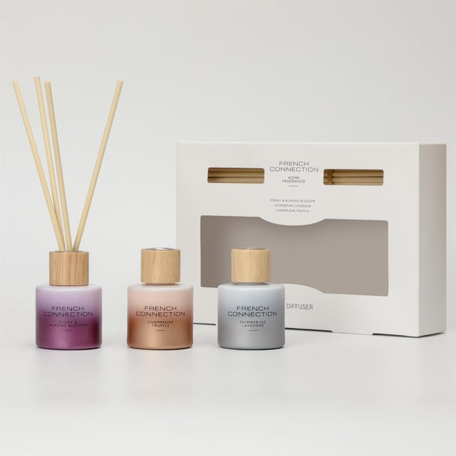 French Connection Metallic Collection Trio of Reed Diffuser Gift Set 3 x 50ml The French Connection Metallic Collection 3 Piece Gift Set is a sophisticated trio of 50ml diffusers, each presented in sleek, metallic containers that add a touch of elegance to any space. Designed to infuse rooms with long-lasting, luxurious scents, each diffuser offers a unique fragrance experience, blending notes that range from fresh and invigorating to warm and comforting. Perfect as a gift or for personal use, this set enhances the ambiance of any home with a modern, refined aesthetic and beautifully layered aromas that elevate the mood and decor.