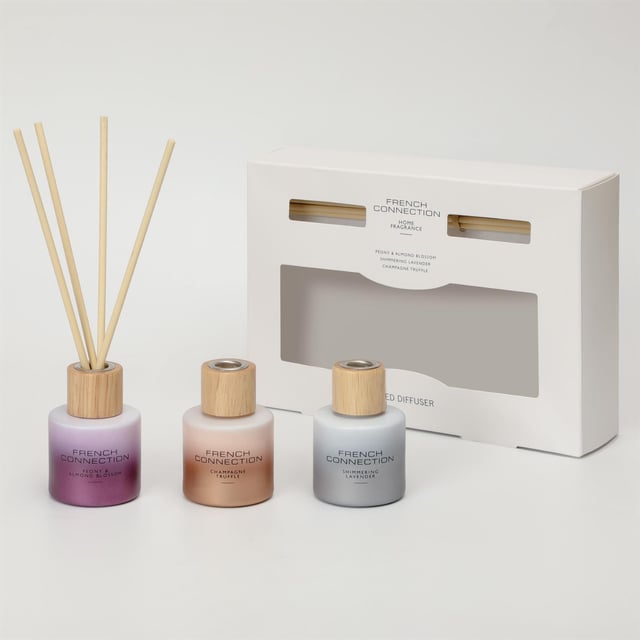 French Connection Metallic Collection Trio of Reed Diffuser Gift Set 3 x 50ml The French Connection Metallic Collection 3 Piece Gift Set is a sophisticated trio of 50ml diffusers, each presented in sleek, metallic containers that add a touch of elegance to any space. Designed to infuse rooms with long-lasting, luxurious scents, each diffuser offers a unique fragrance experience, blending notes that range from fresh and invigorating to warm and comforting. Perfect as a gift or for personal use, this set enhances the ambiance of any home with a modern, refined aesthetic and beautifully layered aromas that elevate the mood and decor.