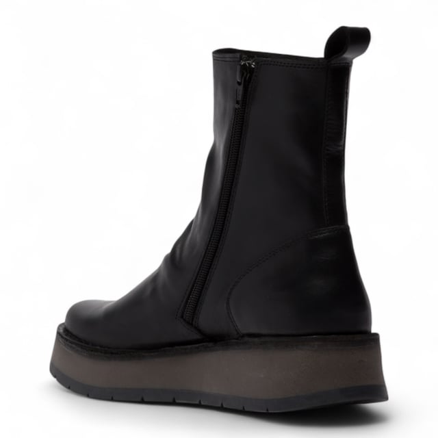 The RENO053FLY from Fly London’s Rawi Line is a sleek and versatile ankle boot crafted from premium leather. Featuring a side zip for easy wear, these boots offer all-day comfort with a soft microfiber lining, cushioned insole, and a stable 3.5 cm wedge heel. Finished with a durable TR rubber sole, they're ideal for both casual and smart-casual outfits.
Upper: Leather
Lining: Microfiber
Insole: Microfiber
Sole: TR Rubber
Heel Height: 3.5 cm
Closure: Zip
Collection: Fly London Women's | Rawi Line
Please note: Natural leather variations such as creases and folds will differ from pair to pair and may not match exactly on both shoes.