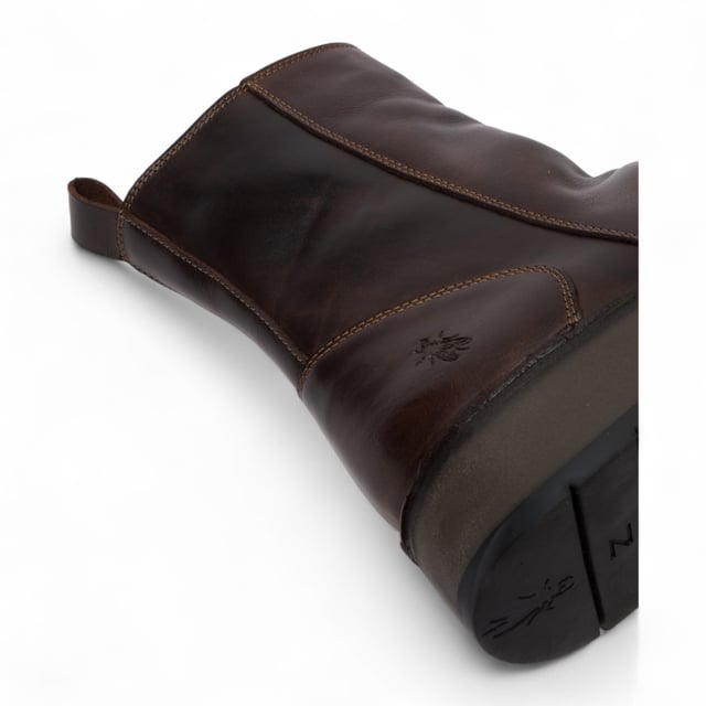 The RENO053FLY from Fly London’s Rawi Line is a sleek and versatile ankle boot crafted from premium leather. Featuring a side zip for easy wear, these boots offer all-day comfort with a soft microfiber lining, cushioned insole, and a stable 3.5 cm wedge heel. Finished with a durable TR rubber sole, they're ideal for both casual and smart-casual outfits.
Upper: Leather
Lining: Microfiber
Insole: Microfiber
Sole: TR Rubber
Heel Height: 3.5 cm
Closure: Zip
Collection: Fly London Women's | Rawi Line
Please note: Natural leather variations such as creases and folds will differ from pair to pair and may not match exactly on both shoes.