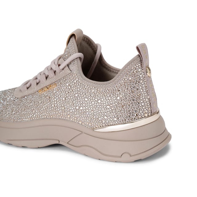 This Carvela Swift Jewel Runner trainer features a taupe fabric upper with gold crystal embellishment. The front laces up with gold tone branding on the eye stay.