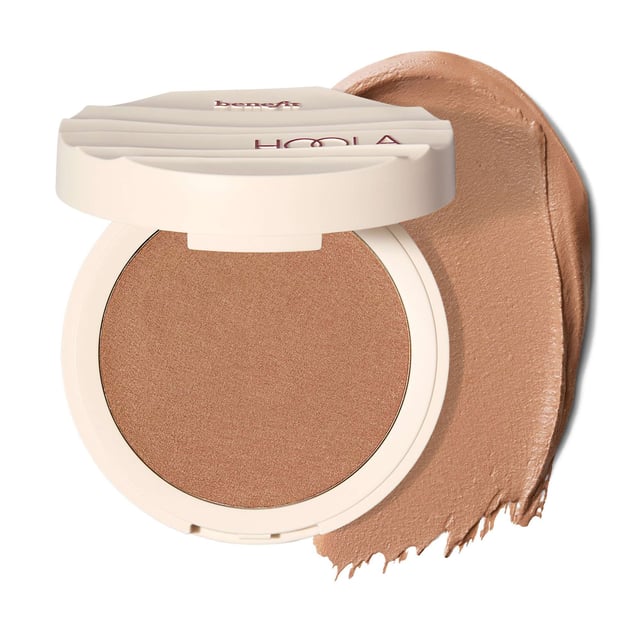 Experience the ultimate sun-kissed glow with Hoola Wave Medium Cream Bronzer. This luxurious, buttery-soft balm brings the best of our bestselling powder bronzer to your makeup routine, providing a natural finish that lasts all day. Infused with nourishing ingredients like jojoba seed oil and shea butter, it hydrates your skin while delivering a stunning bronzed look. Waterproof and sweat-resistant, it's perfect for any occasion. Enjoy buildable coverage for a radiant, beach-ready complexion.