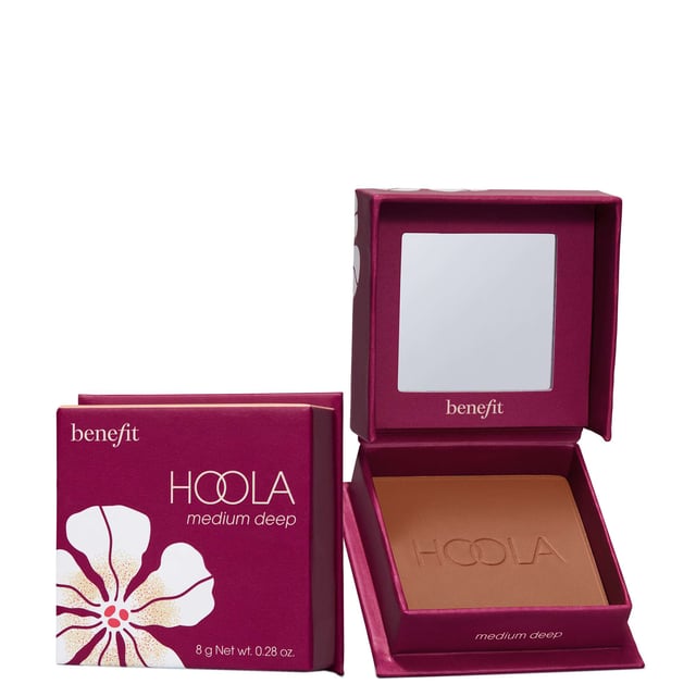 Discover the iconic Benefit Hoola Medium Deep Matte Powder Bronzer, your secret to a sun-kissed glow. This award-winning bronzer has an ultra-fine, silky-soft texture that easily builds and blends for a natural matte finish. Enjoy long-lasting bronze that stays put for 12 hours, no matter the weather. Waterproof and smudge-proof, it’s perfect for any occasion. With shades to suit every skin tone, it’s a favorite among beauty enthusiasts. Elevate your makeup game with Hoola for that beach vacation look, even in chilly weather.