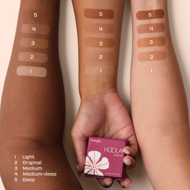 Discover the iconic Benefit Hoola Matte Powder Bronzer, a must-have for achieving a sun-kissed glow. This bestselling bronzer comes in 8g of silky-soft powder that blends seamlessly for a natural matte finish. Available in four flattering shades, Hoola is loved for its blendable formula that delivers a warm, radiant complexion. Perfect for enhancing your cheekbones or adding an all-over bronzed look, this award-winning bronzer is your go-to for a beautiful, sunlit finish. For best results, use with Benefit’s Multitasking Cheek Brush, sold separately.