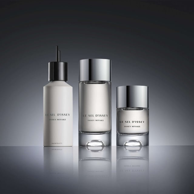 Discover the invigorating scent of Le Sel d'Issey Eau de Toilette, a unique vegan fragrance for men by Issey Miyake. This dynamic perfume captures the essence of salt, blending fresh woody and marine notes for a refreshing experience. Crafted with 95% natural origin ingredients, it features top notes of salt accord and ginger, heart notes of marine seaweed, and base notes of cedarwood. The beautifully designed bottle, made from 20% recycled glass, is available in refillable 50ml and 100ml sizes, with an eco-friendly 150ml refill option.