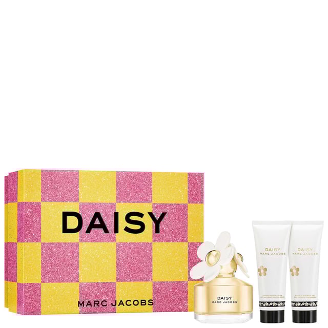 Discover the enchanting Marc Jacobs Daisy Eau de Toilette Spray Gift Set. This fragrance embodies optimism and beauty with top notes of wild berries and white violets, a heart of velvety jasmine, and a base of sensual sandalwood. The set includes a 50ml Eau de Toilette Spray, a 75ml Body Lotion, and a 75ml Shower Gel, making it a perfect gift for yourself or a loved one. Embrace your femininity with the charm of Daisy Marc Jacobs.