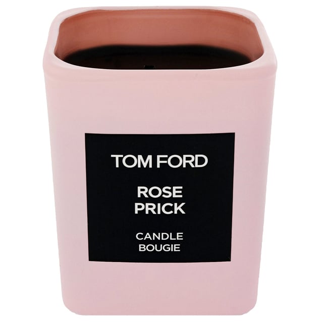 Tom Ford Private Blend Rose Prick Candle - Luxurious Floral Scent Experience the enchanting aroma of Tom Ford's Private Blend Rose Prick Candle. This exquisite candle captures the elegance of roses intertwined with the intrigue of thorns. The fragrance opens with spicy Sichuan pepper, transitioning into a heart of May and Bulgarian roses. The base features earthy patchouli and creamy tonka bean. Inspired by Tom Ford's private rose garden, this candle is a perfect addition to any space, offering a rich floral scent. Dimensions: Height 2.25 inches / 5.7 cm.