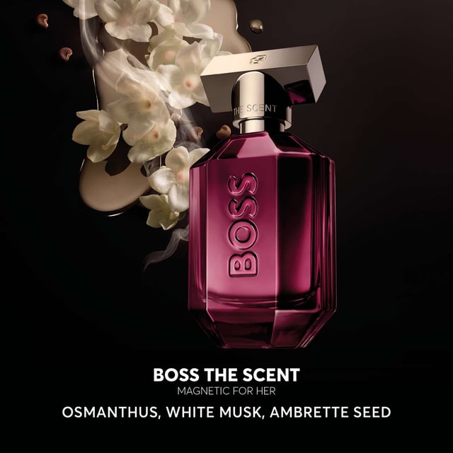 Unleash your allure with HUGO BOSS BOSS The Scent Magnetic for Her Eau de Parfum. This enchanting fragrance embodies the powerful chemistry of a dynamic couple, drawing you into its irresistible embrace. It opens with rich Osmanthus flower notes, intertwined with sensual White Musk, creating a magnetic allure. The experience deepens with a warm Amber base, elevating empowerment and sensuality. Housed in a stunning deep-purple bottle adorned with the BOSS logo and a chic icy-gold cap, this fragrance reflects the multifaceted nature of attraction.