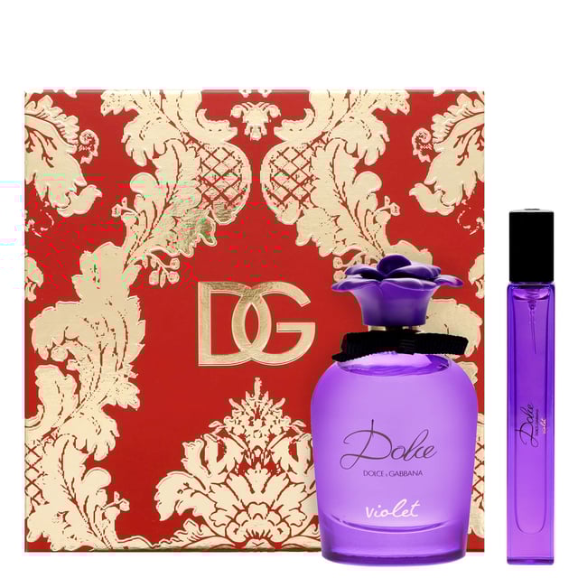 Discover the enchanting scent of Dolce&Gabbana Dolce Violet Eau de Toilette, a luxurious gift set that embodies the elegance of the violet flower. This refreshing floral fragrance opens with a tart blackcurrant note, leading to a delicate heart of violet that exudes femininity. The base features sweet Madagascan vanilla, adding warmth and charm. This gift set includes a 75ml Eau de Toilette spray and a convenient 10ml travel spray, perfect for on-the-go fragrance refreshment. Elevate your fragrance collection with this exquisite set.