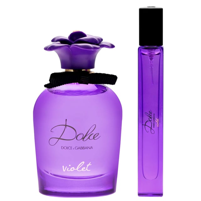 Discover the enchanting scent of Dolce&Gabbana Dolce Violet Eau de Toilette, a luxurious gift set that embodies the elegance of the violet flower. This refreshing floral fragrance opens with a tart blackcurrant note, leading to a delicate heart of violet that exudes femininity. The base features sweet Madagascan vanilla, adding warmth and charm. This gift set includes a 75ml Eau de Toilette spray and a convenient 10ml travel spray, perfect for on-the-go fragrance refreshment. Elevate your fragrance collection with this exquisite set.