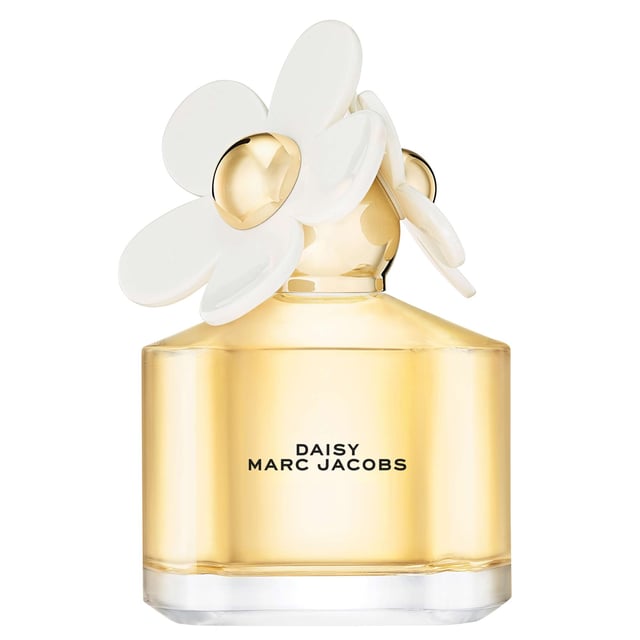 Discover the enchanting allure of Marc Jacobs Daisy Eau de Toilette, a fragrance that embodies optimism and beauty. This delightful scent opens with fresh wild berries and soft white violets, leading to a heart of velvety jasmine that transitions into a warm drydown of sensual sandalwood. Created by Master Perfumer Alberto Morillas, this captivating perfume is housed in a whimsical bottle adorned with charming daisies, making it as unique as the woman who wears it. Please note, we cannot ship fragrances over 150ml outside of the UK.