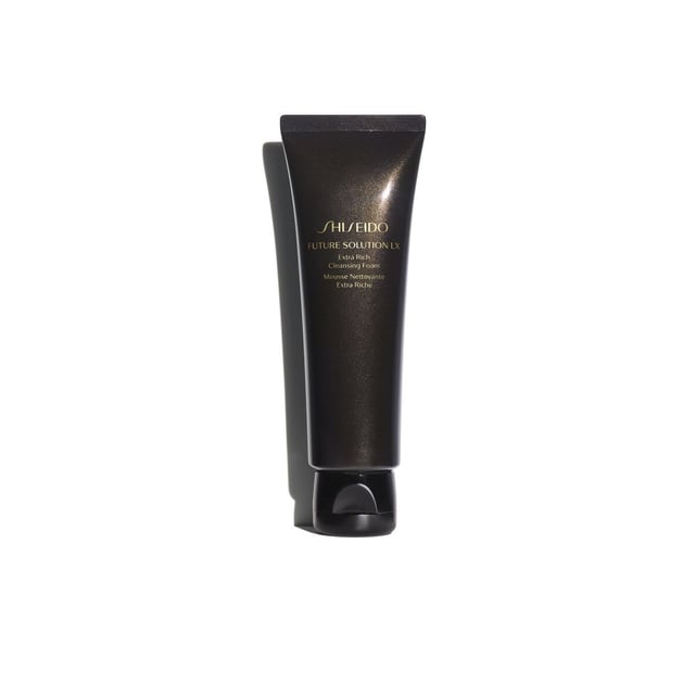 Experience the luxurious Shiseido Future Solution LX Extra Rich Cleansing Foam, a creamy cleanser designed to gently remove impurities without drying your skin. This rich formula not only cleanses but also enhances your skin's ability to absorb nourishing creams and treatments, promoting a healthier and more even complexion. For optimal results, use morning and evening by mixing a small amount with water to create a rich lather. Massage gently in circular motions over your face and rinse thoroughly for a refreshed and revitalized appearance.