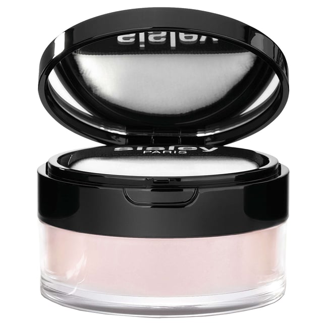Discover the luxurious Sisley Phyto-Poudre Libre 03 Rose Orient, a lightweight loose powder that acts like a delicate veil on your skin. Infused with Sisley's advanced skincare technology, this powder not only mattifies your complexion but also enhances its softness for a flawless finish. Enriched with nourishing extracts of hibiscus, linden blossom, and mallow, it cares for your skin while providing a smooth, refined look. Perfect for setting makeup or wearing alone, this powder is a must-have for a radiant appearance.