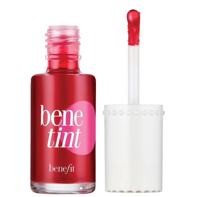 Experience the ultimate rosy glow with Benefit Benetint, the original lip and cheek stain that delivers a sexy flush in seconds. Created for an exotic dancer in the 1970s, this cult-favorite product offers a sheer, buildable color that lasts for hours without smudging or drying out. The convenient doe foot applicator makes it easy to apply on lips and cheeks for a stunning look. Perfect for all-day wear, layer with your favorite gloss for a more intense pout. Join the countless celebrities and makeup artists who adore this timeless beauty staple!