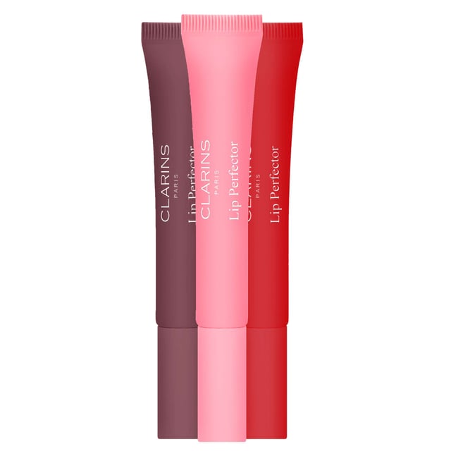 Experience the ultimate in lip care with Clarins Lip Perfector Glow. This luxurious lip treatment is enriched with shea butter and wild mango butter, designed to deeply hydrate and pamper your lips. Enjoy a plump, healthy appearance as this formula effortlessly melts onto your lips, providing up to 8 hours of long-lasting moisture and comfort. Ideal for daily use, the Lip Perfector Glow adds a touch of radiance to your smile while ensuring your lips remain soft and beautifully nourished.