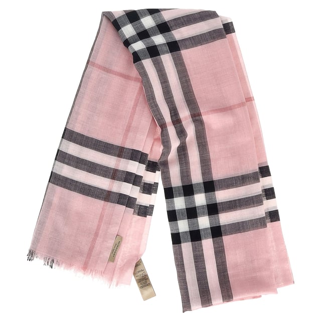 VINTAGE, RRP AS NEW
The **Burberry Check Print Fringed Scarf** in pink wool is a luxurious and versatile accessory, showcasing the iconic check pattern in a soft, feminine hue. Its plush wool fabric keeps you cozy while the fringed edges add a touch of casual elegance. **Style Tip:** Drape it over a neutral-toned sweater and tailored coat to brighten up a winter look, or tie it around the handle of your handbag for a chic pop of color.

 Burberry Check Print Fringed Scarf in Pink Wool

Condition: Excellent
Signs of wear:  No sign of wear.
Packaging: None
Color: Pink
Material: Wool
Size: One Size | One Size
Measurements: Height: 2160; Length: 1620
SKU: NAPPUGBAC511836W
