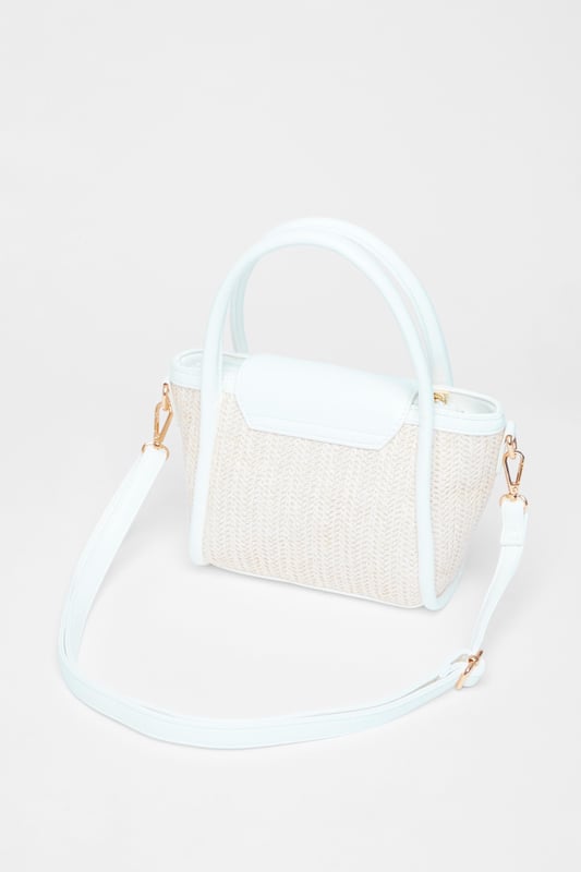 - Woven finish - Faux leather trim - Zip closure - Detachable strap - Top handle - Length: 19cm - Depth: 11.5cm - Height: 16cm approx