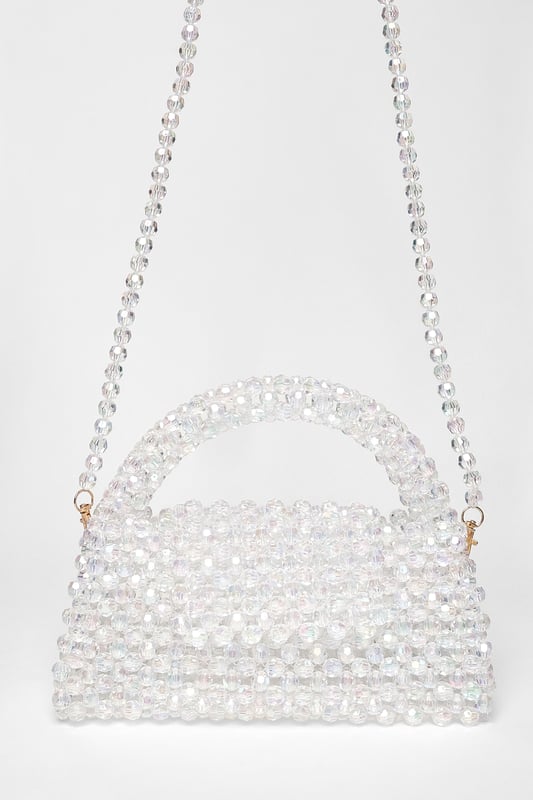 - Resin finish - Beaded design - Top handle - Mini size - Length: 23cm - Depth: 5.5cm - Height: 19cm - Wipe clean