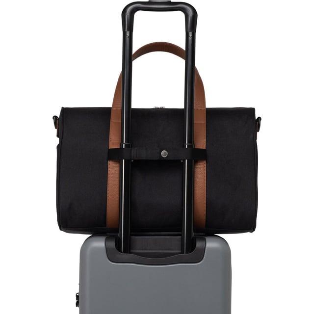 Carry on the go. Herschel re-invented their bestselling duffle for carry-on travel. Built with a padded laptop sleeve and trolley strap, it attaches to your luggage for your next trip.