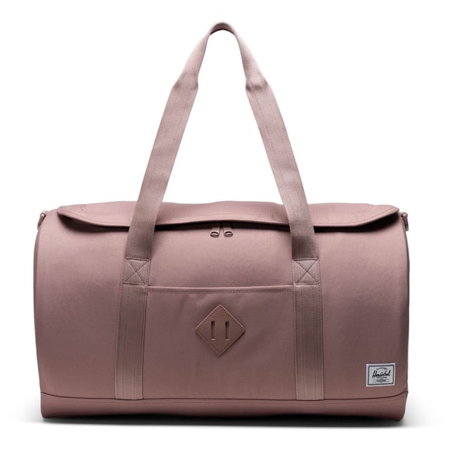 Pack for last-minute plans. Made with our signature diamond detail and 100% recycled EcoSystem fabrics, the Herschel Heritage Duffle offers easy-access packing with a U-shaped opening for spontaneous trips and weekends away.