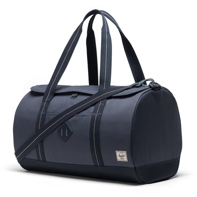 Pack for last-minute plans. Made with our signature diamond detail and 100% recycled EcoSystem fabrics, the Herschel Heritage Duffle offers easy-access packing with a U-shaped opening for spontaneous trips and weekends away.
