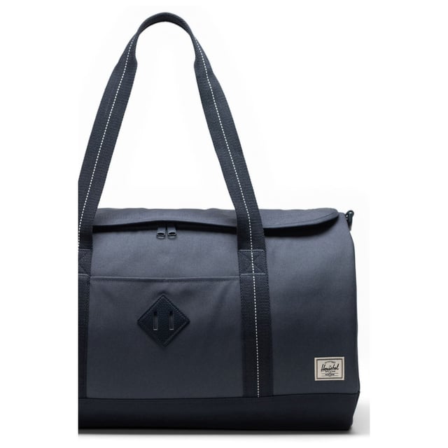 Pack for last-minute plans. Made with our signature diamond detail and 100% recycled EcoSystem fabrics, the Herschel Heritage Duffle offers easy-access packing with a U-shaped opening for spontaneous trips and weekends away.