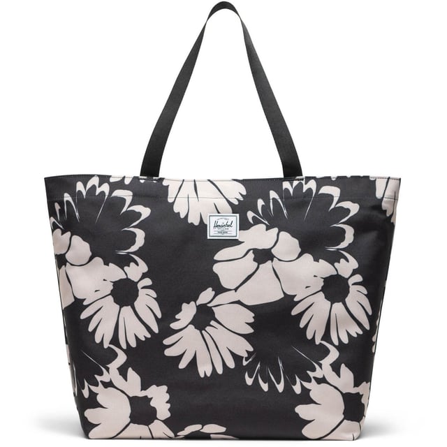 The one that lives on the hook at the front door. Always ready to hit the farmer's market, load up for a picnic or hit the beach. Constructed with a simple design, this utilitarian hero is your do-it-all tote.