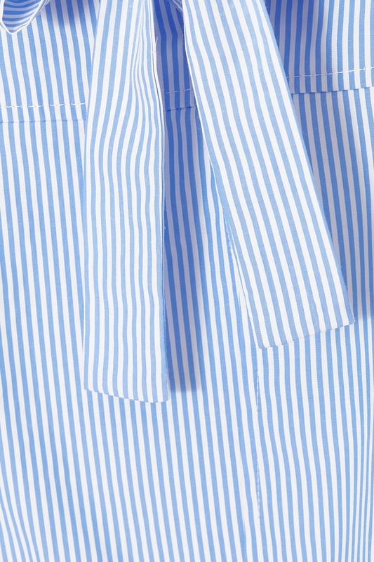 - Square neck - Striped pattern - Tie front details - Peplum hem - Model height: 5'7" - Model wears uk 18 / us 14 / eur 46 - Always check the wash care label - Cool hand wash with mild detergent